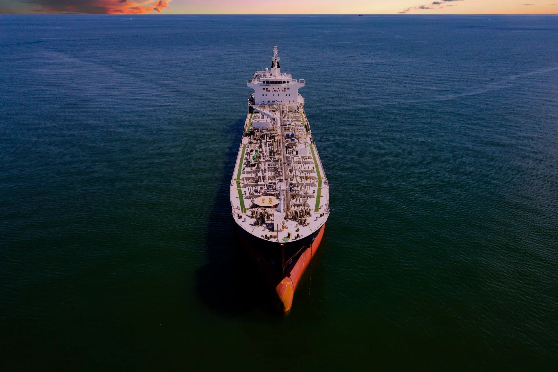 An energy tanker at sea in the evening